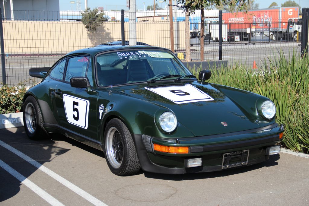 Porsche 911 classic in green with number 5 livery