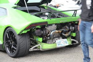 The engine bay of a twin turbocharged Lamborghini Huracan, shown from the rear with rear bumper removed